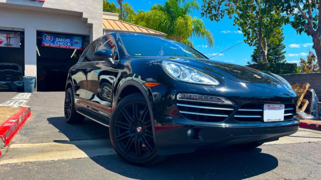 2014 Porsche Cayenne Diesel parked outside Euro Auto Tech & Smog in La Mesa, CA, showcasing its sleek black exterior and modern design, relevant to preventive maintenance tips for diesel vehicles.